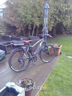 E- bike excellent condition with rear rack/bag and mud guards