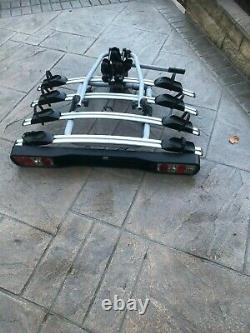 For sale 4 bike tow bar cycle carrier rack great condition with rear lights